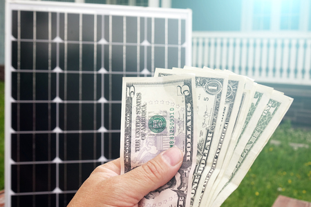 Saving American money on renewable energy and solar panels. savingsの写真素材