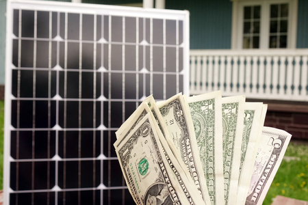 Saving American money on renewable energy and solar panels. savingsの写真素材