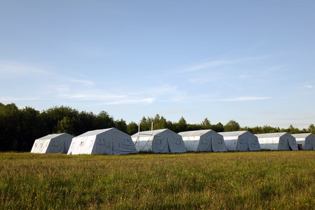 white large army tents. rescue camp. military baseの写真素材