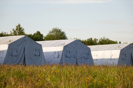 white large army tents. rescue camp. military baseの写真素材