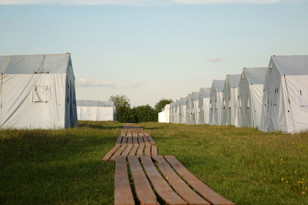 white large army tents. rescue camp. military baseの写真素材