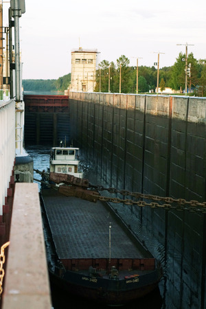 Vytegra. Russia. June 2018: Cargo barge is locked.のeditorial素材