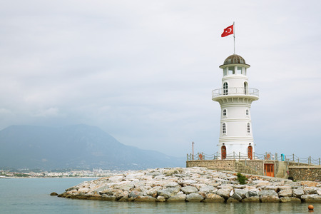 Alanya, Turkey-June 2018: lighthouse at the gate to the Harbor in Alanya. Sightseeing In Turkey.