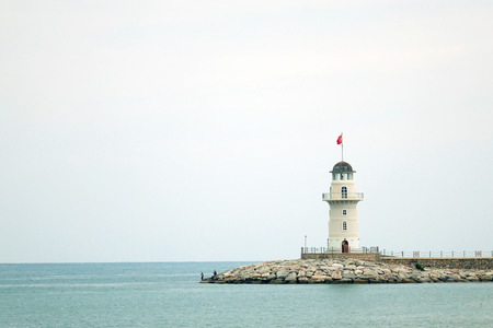 Alanya, Turkey-June 2018: lighthouse at the gate to the Harbor in Alanya. Sightseeing In Turkey.のeditorial素材