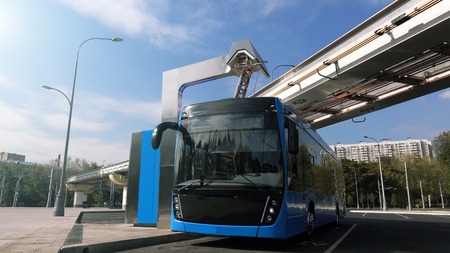 Blue electric bus at the charging station.Modern trains on the monorail. The concept of ecological transport