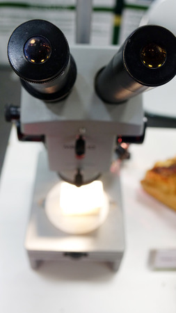 Close-up of optical microscope for laboratory use.の写真素材