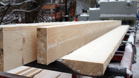 Sawmill. The process of processing logs in the sawmill equipment . Wood work . Woodworking.の写真素材