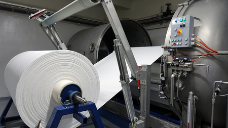 Weaving machines of the cotton factories. Production of textiles.