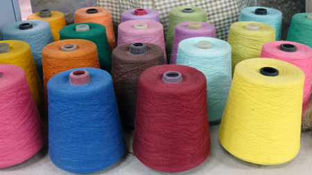 Colorful reels of threads background. textileの写真素材
