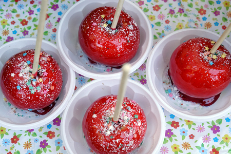 Baked red apple dessert with icing sugar, cinnamon, honey, raisins.Autumn fruit sweets.の写真素材