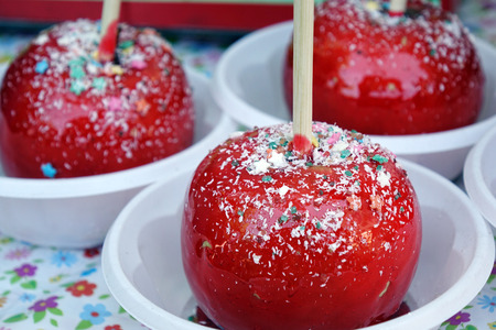 Baked red apple dessert with icing sugar, cinnamon, honey, raisins.Autumn fruit sweets.の写真素材