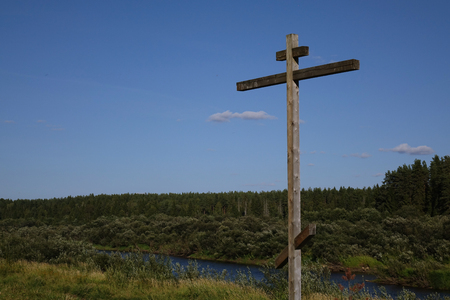 Orthodox cross on the river Bankの写真素材