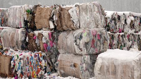 Plastic bales of garbage at the waste processing plant. Processing and storage of waste for further disposalの写真素材