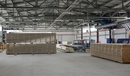 Woodworking enterprise. Production of stacked pine wood for processing and furniture production .の写真素材