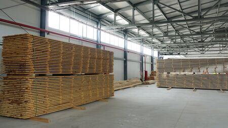 Woodworking enterprise. Production of stacked pine wood for processing and furniture production .の写真素材