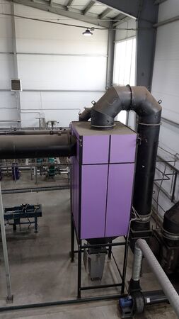 steamshop with new equipment. Production of thermal energy by burning wood waste.の写真素材