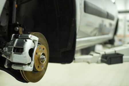 Cars in the service station. Maintenance of the carの写真素材