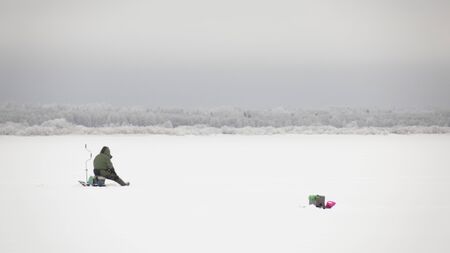 winter fishing on ice, natural backgroundの写真素材