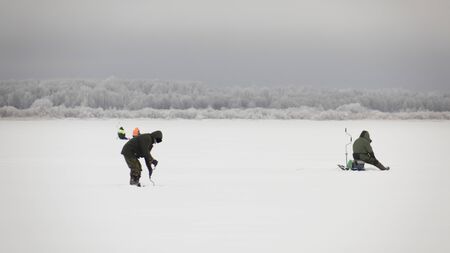 winter fishing on ice, natural backgroundの写真素材