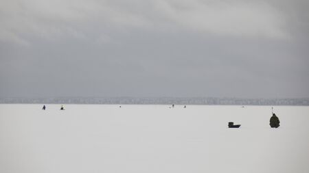 winter fishing on ice, natural backgroundの写真素材