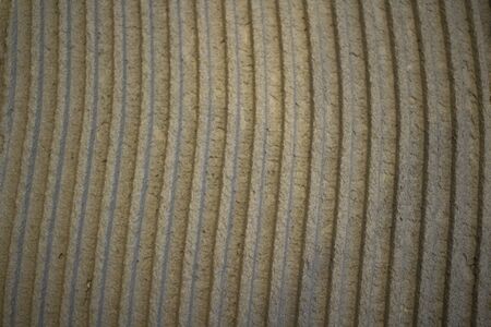 Texture of the wet adhesive layer.Structure of construction glue. Grey pattern of putty coating.