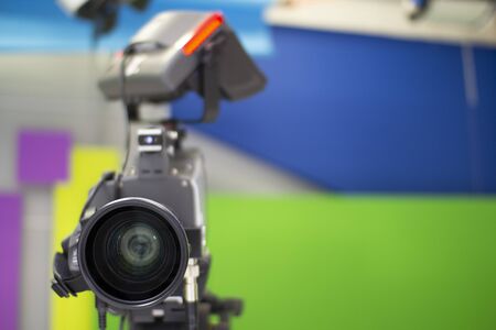 TV camera in the Studio.  and professional high-definition video camera on a tripod
