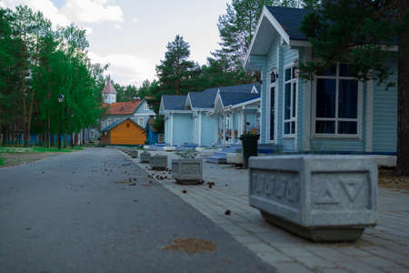 Wooden cottage in a pine forest.の写真素材