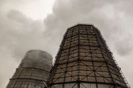 Smoke from pipes with emissions of harmful substances at an industrial metallurgical plant.の写真素材