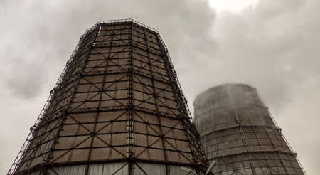 Smoke from pipes with emissions of harmful substances at an industrial metallurgical plant.の写真素材