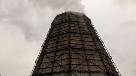 Smoke from pipes with emissions of harmful substances at an industrial metallurgical plant.の写真素材