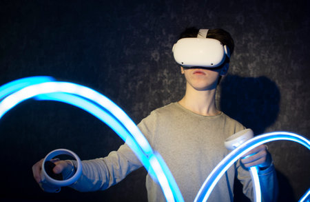 A teenager wearing virtual reality glasses .Technologies of the future.の写真素材