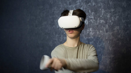 A teenager wearing virtual reality glasses .Technologies of the future.の写真素材
