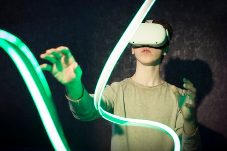 A teenager wearing virtual reality glasses .Technologies of the future.の写真素材