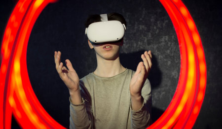 A teenager wearing virtual reality glasses .Technologies of the future.の写真素材