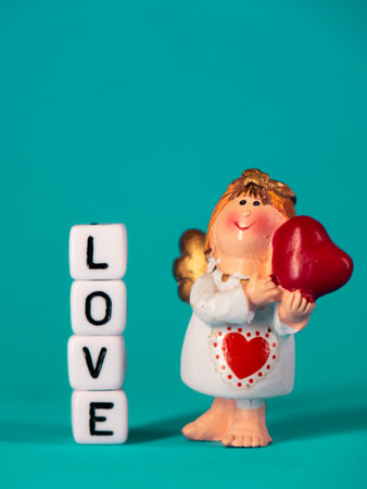 Cute angel and a declaration of love. Valentines Day. Postcard for the holidays.