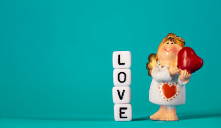 Cute angel and a declaration of love. Valentines Day. Postcard for the holidays.の写真素材