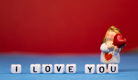 Cute angel and a declaration of love. Valentines Day. Postcard for the holidays.の写真素材