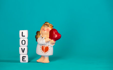 Cute angel and a declaration of love. Valentines Day. Postcard for the holidays.の写真素材