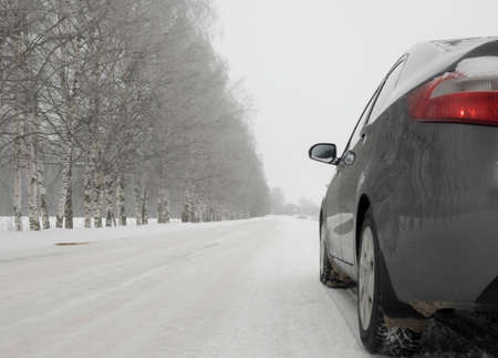 A car on a winter road. The concept of safe driving.の写真素材