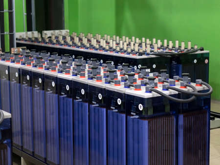 Rows of industrial storage batteries.A room used for backup or uninterruptible power supply.の写真素材