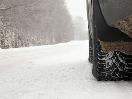 A car on a winter road. The concept of safe driving.の写真素材