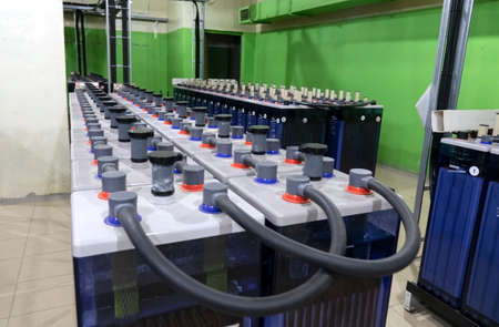 Rows of industrial storage batteries.A room used for backup or uninterruptible power supply.の写真素材
