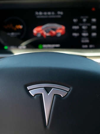 TESLA CAR, RUSSIA, April 2021: the logo of the Tesla electric car. Touch screen close-up inside an autonomous Tesla car .のeditorial素材