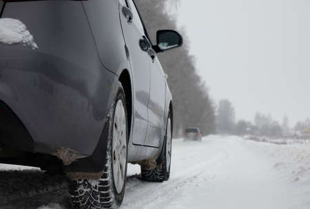 A car on a winter road. The concept of safe driving.の写真素材
