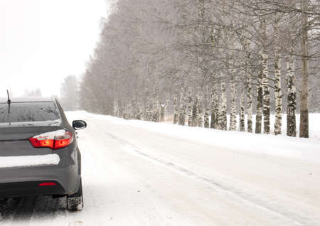 A car on a winter road. The concept of safe driving.の写真素材