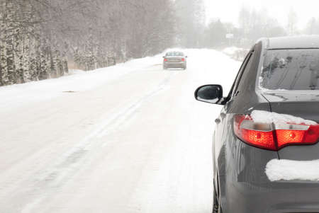 A car on a winter road. The concept of safe driving.の写真素材