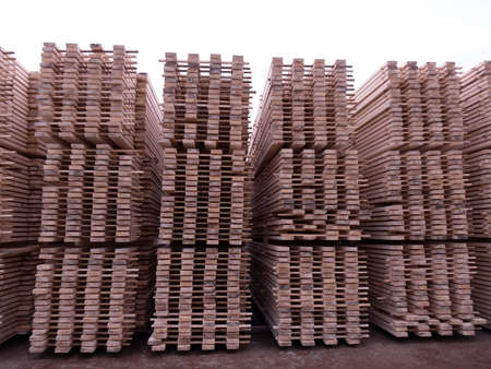 Lumber warehouse. Wooden boards in a stackの写真素材