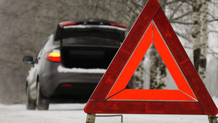 An emergency stop sign.Winter time.の写真素材