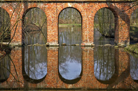 Ruins of Aqueduct in Arkadia park. Lowicz county. Polandの写真素材