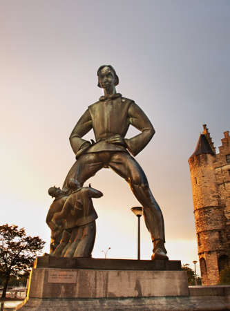 Statue of Lange Wapper in front of Het Steen in Antwerp. Belgiumのeditorial素材
